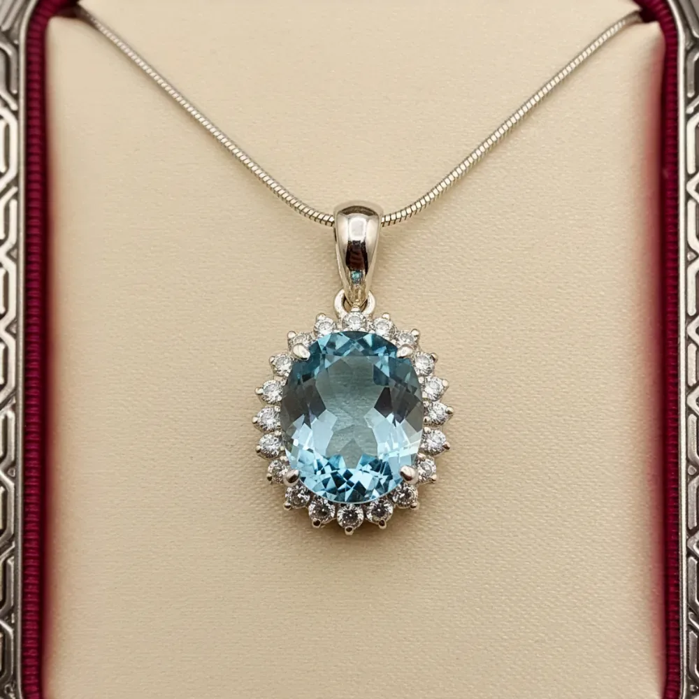 Blue Topaz Halo Elegance Pendant