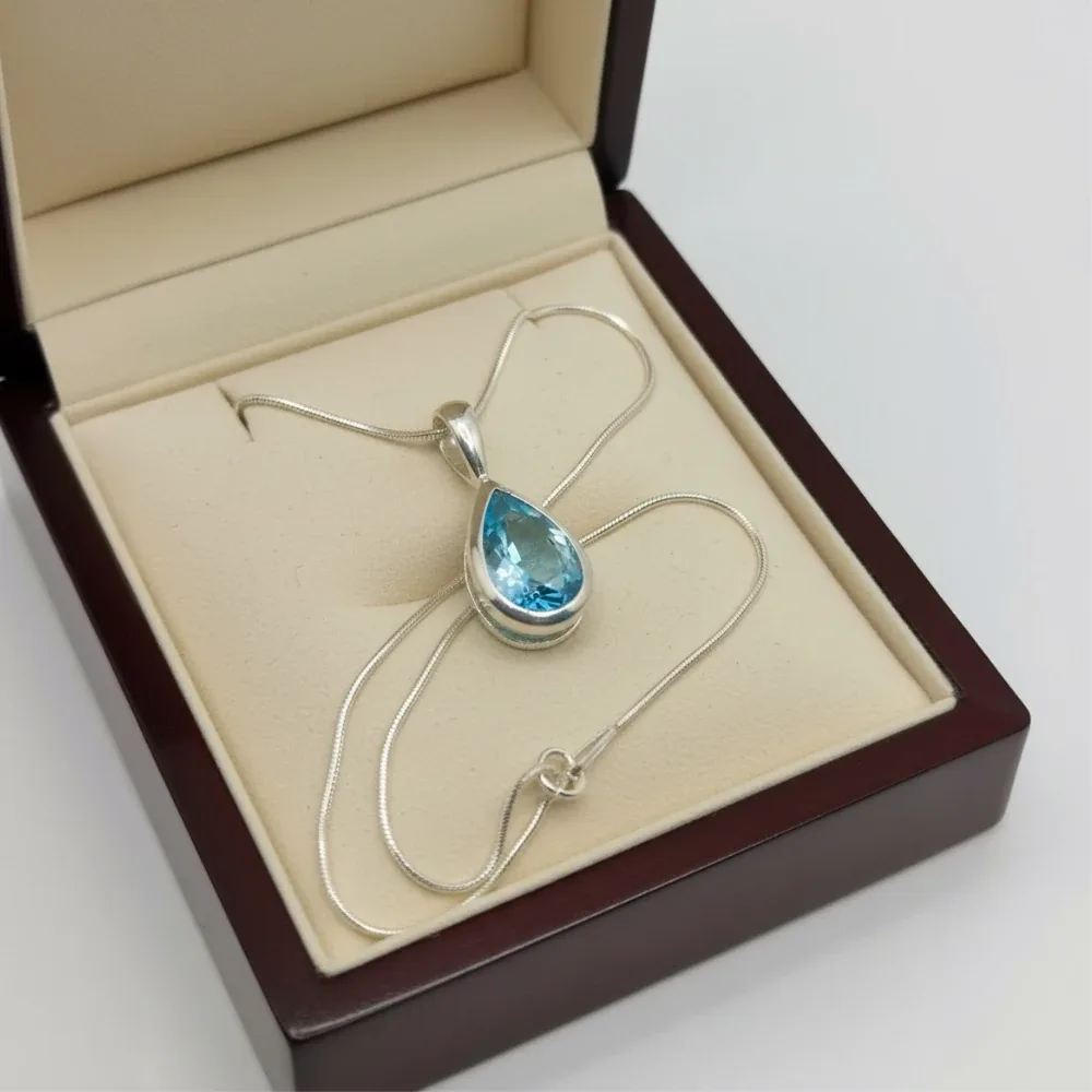Blue Topaz Glow Teardrop Pendant