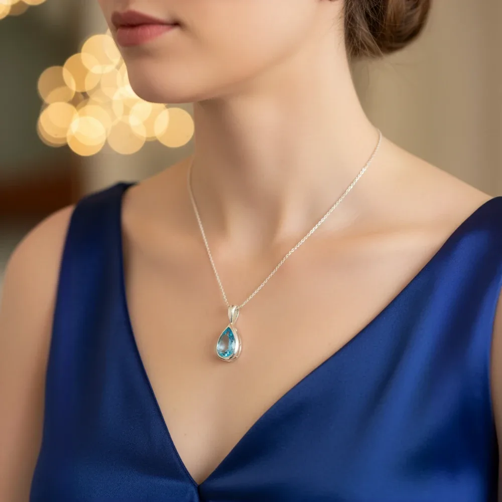 Blue Topaz Glow Teardrop Pendant